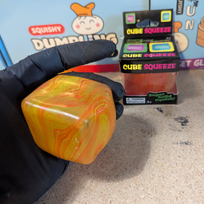 Yellow vs Orange Swirl Squeeze Cube (Super Slow-Rising Squish)